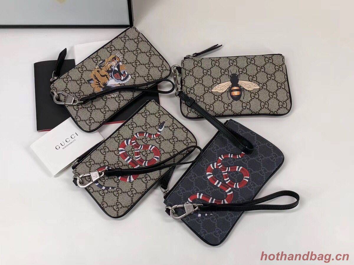 Gucci Bee print GG Supreme pouch 522866