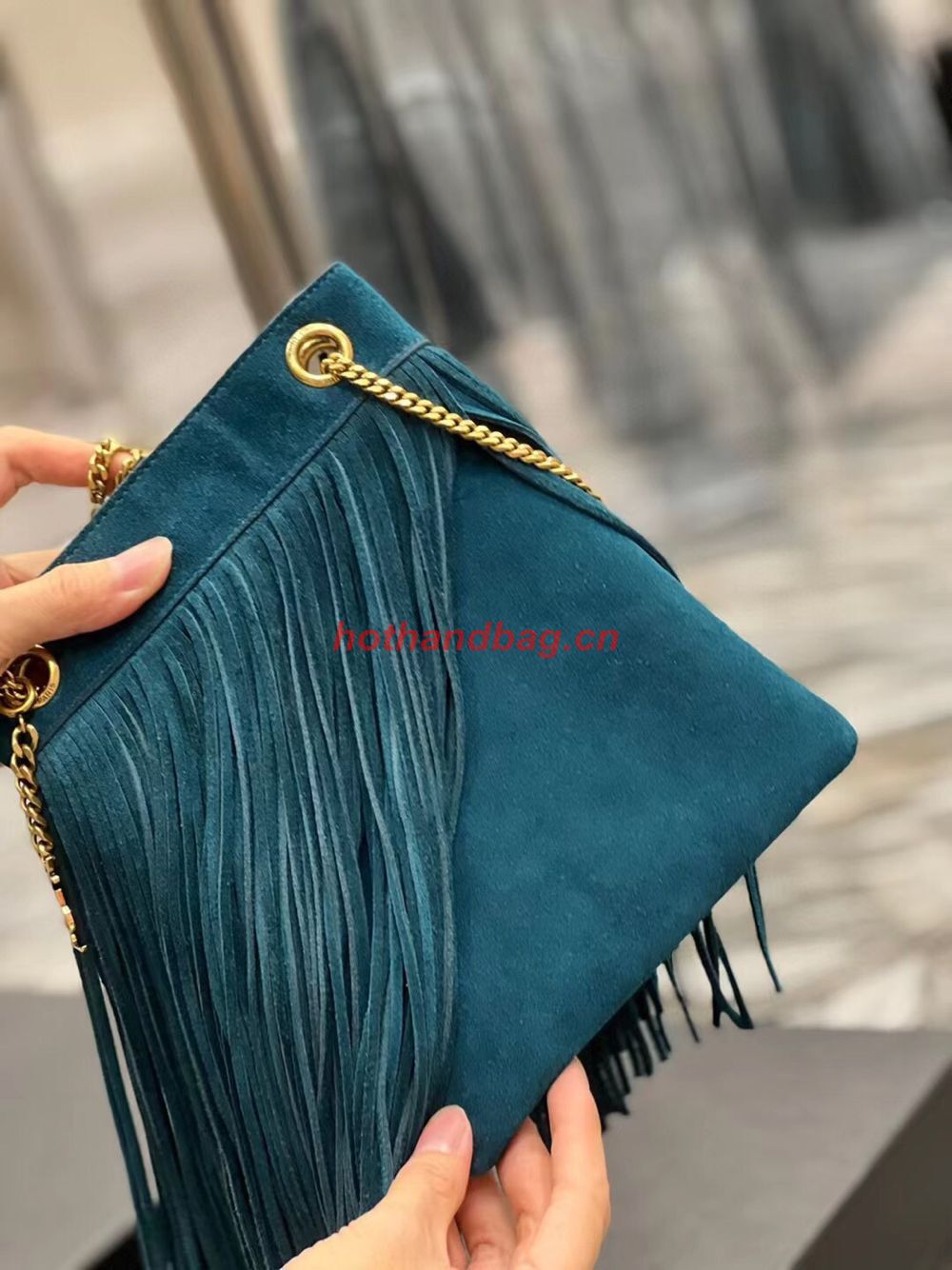 SAINT LAURENT SMALL CHAIN BAG IN LIGHT SUEDE WITH FRINGES 683378 blue