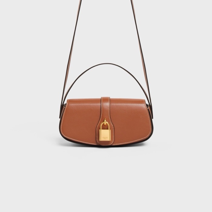 CELINE CLUTCH ON STRAP TABOU IN SUPPLE CALFSKIN 101592 TAN