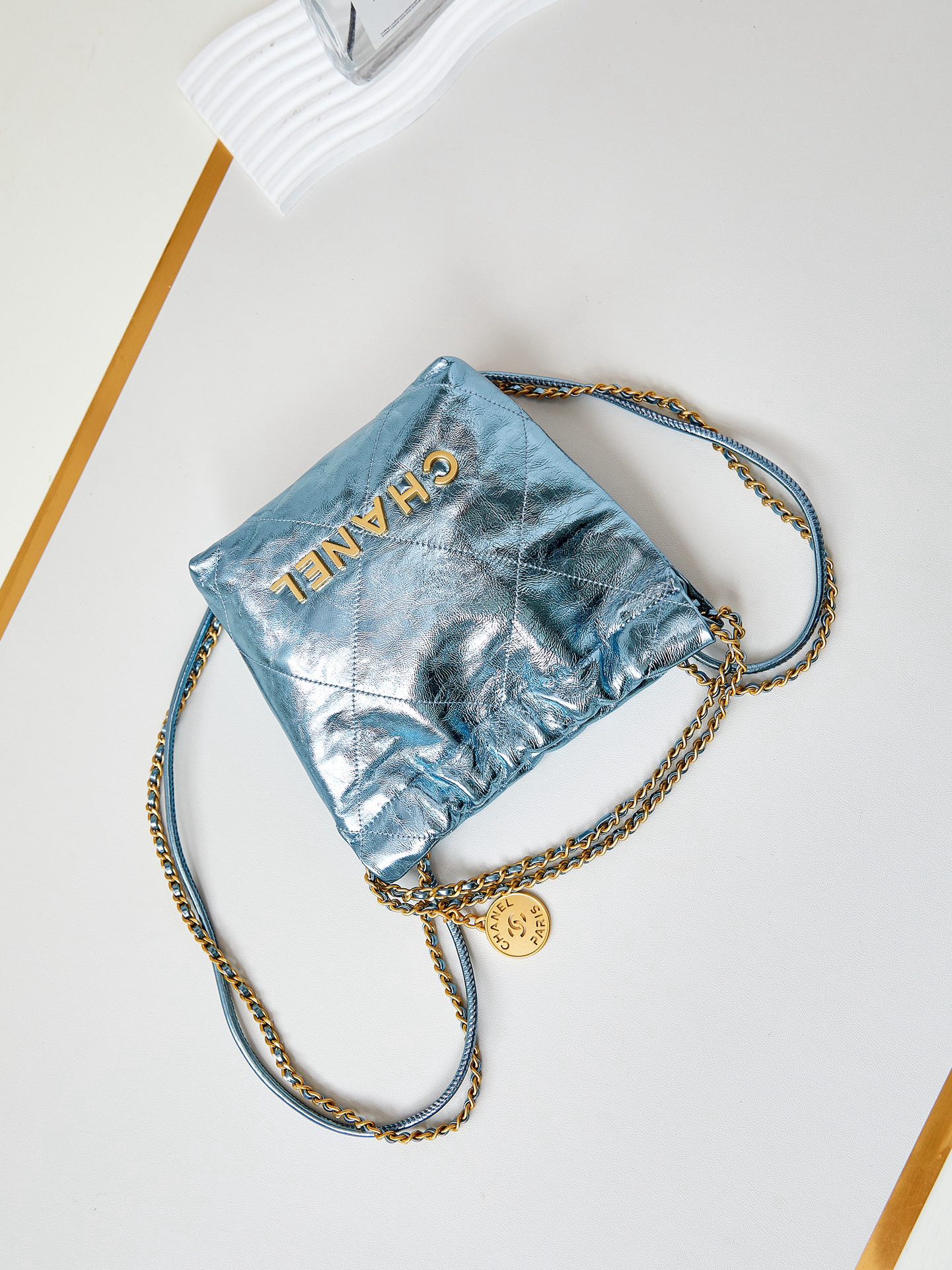 CHANEL 22 MINI HANDBAG AS3980 Pearlescent blue