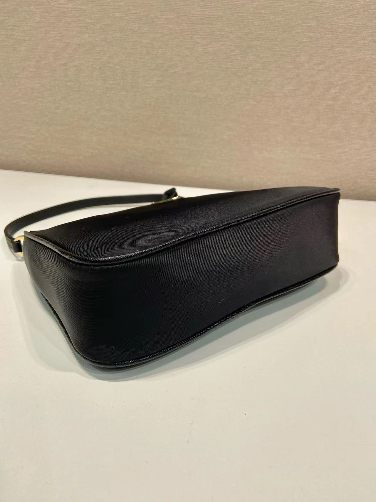 Prada Re-Nylon and brushed leather mini-bag 1BC515 black